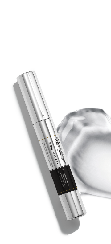 Gloss Therapy lip product tube on white background with plastic cap.