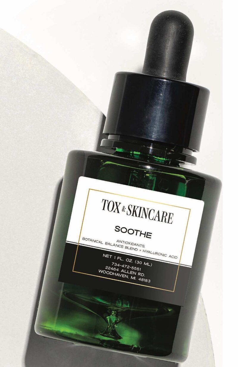 Tox & Skincare Soothe serum bottle with dropper, featuring antioxidants and hyaluronic acid for skin balance.